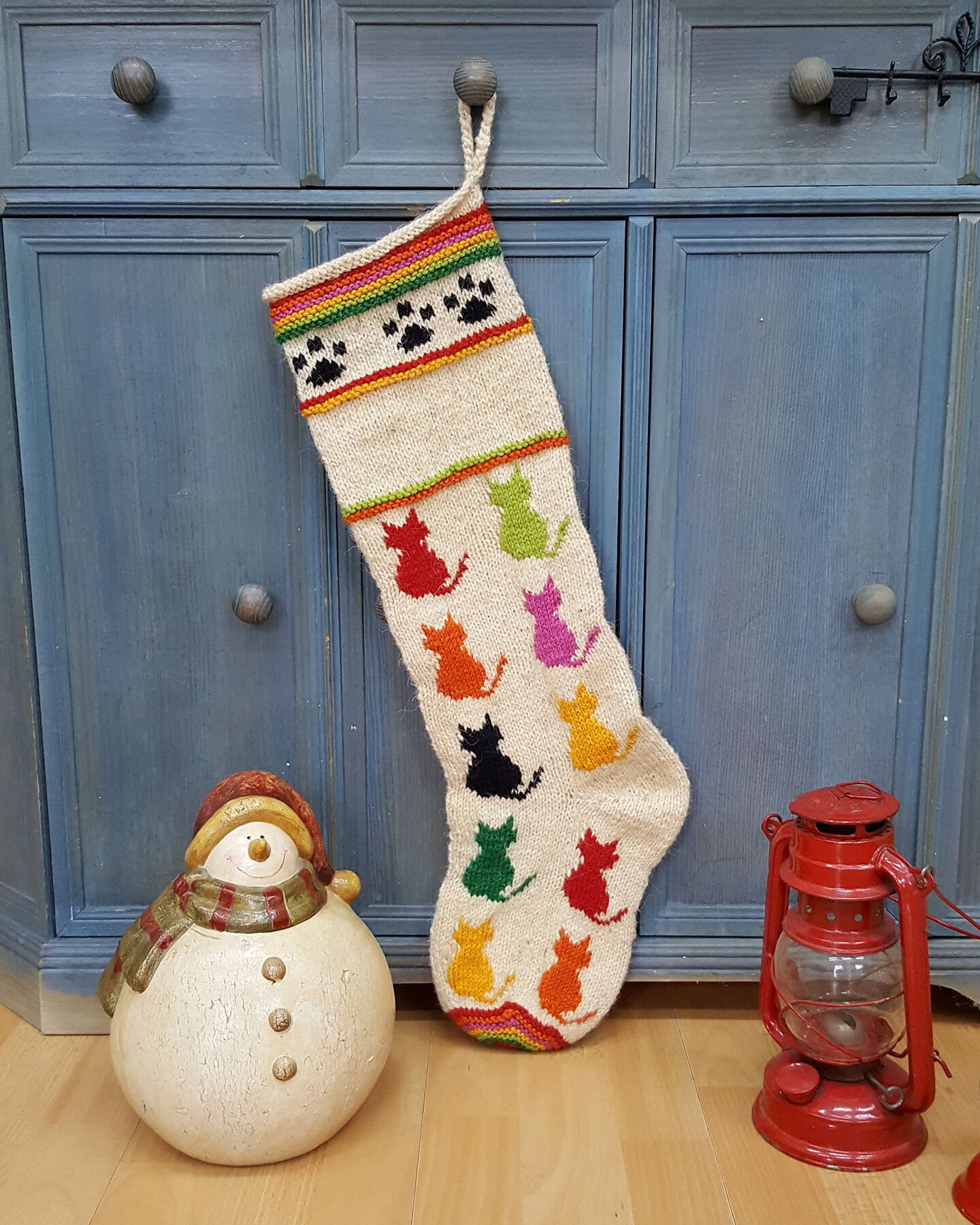 Hand-knit holiday tree stocking with colorful cat silhouettes and paw prints, Fair-Trade handmade