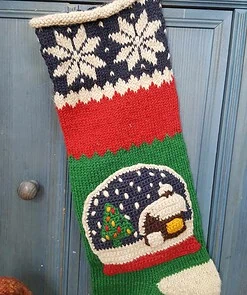 Custom embroidered name on red raw makes this Christmas stocking with snowball unique.