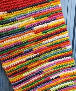 Close-up of crochet stitches on fair trade personalized Christmas stocking