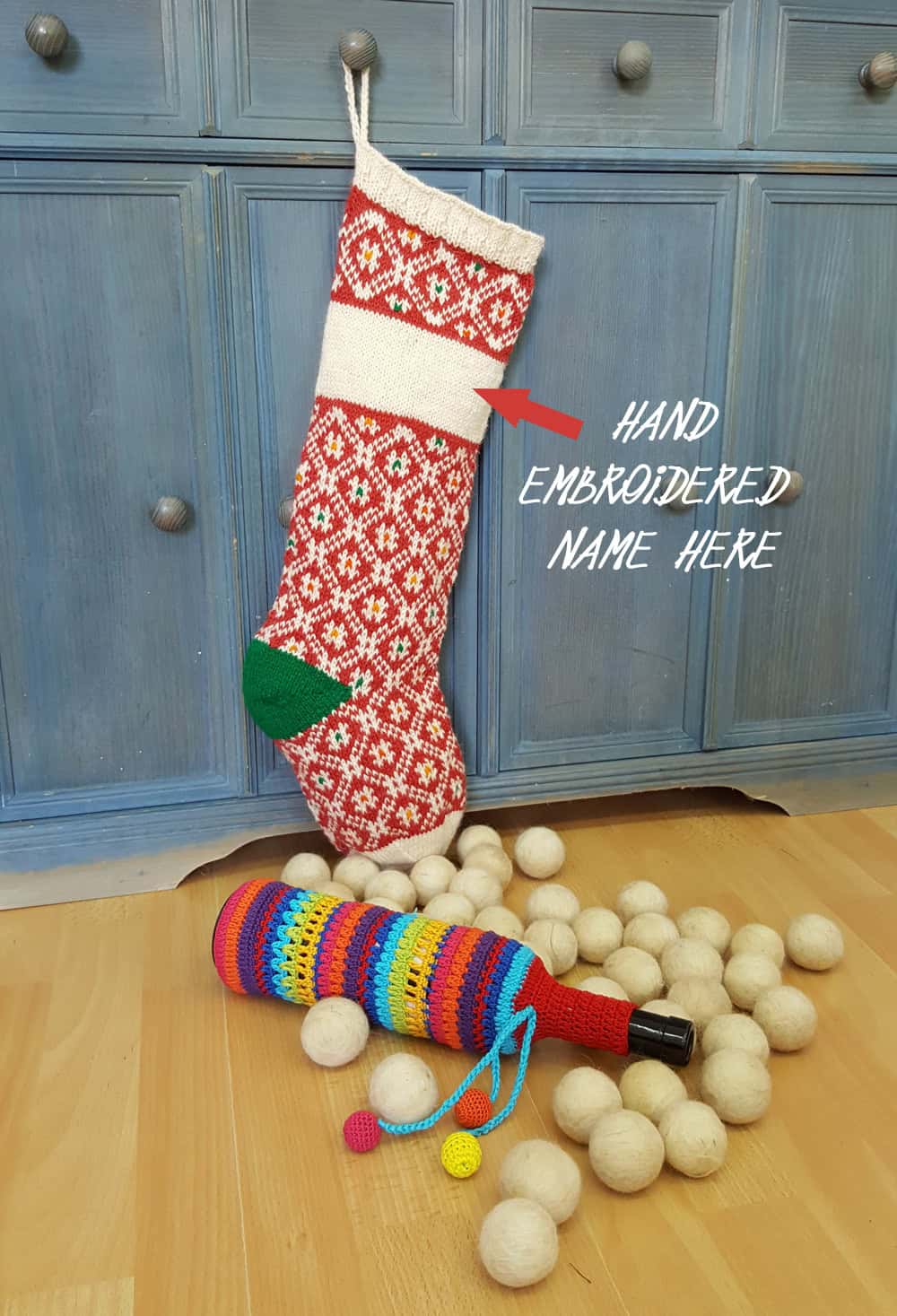 Handmade Christmas stocking with with red and cream pattern, customizable with a name.