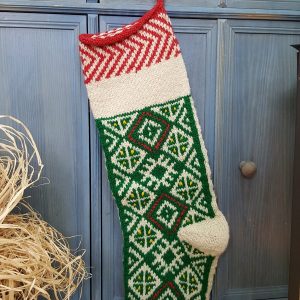 Traditional pattern on green Christmas tree stocking for your holiday home decor