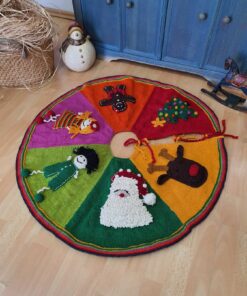 Hand-knit Fair Trade hand knit Christmas tree skirt with colorful circular stripes