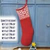 Artisan jacquard knit Christmas stocking hanging on a mantel, double-sided pattern