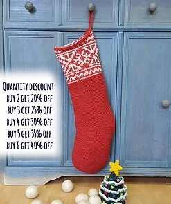 Artisan jacquard knit Christmas stocking hanging on a mantel, double-sided pattern
