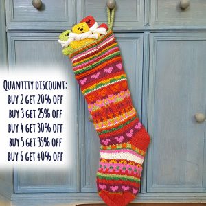 Colorful striped Christmas stocking with heart details, handmade