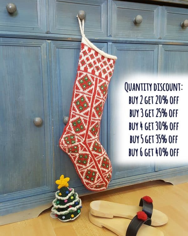 Jacquard hand-knitted red and white Christmas stocking with traditional pattern