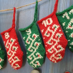 Close-up of a hand-knit mini stocking from the advent calendar
