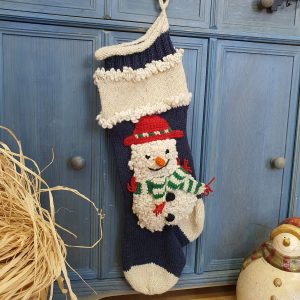 Hand-knit blue Christmas stocking with snowmen appliqué, personalized name on cuff