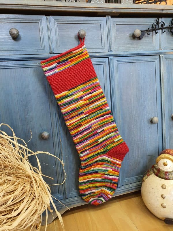 Hand-crocheted personalized Christmas stocking with name embroidery, artisan made. fair trade