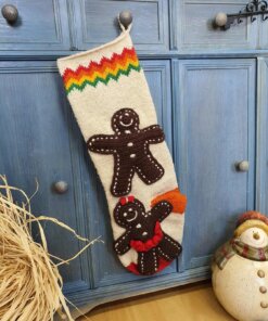 Hand-knit gingerbread man Christmas stocking with personalized name on cuff