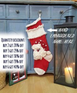 Personalized Christmas stocking with space for custom name, hand-knitted with Santa design.