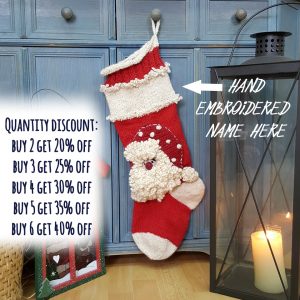 Personalized Christmas stocking with space for custom name, hand-knitted with Santa design.