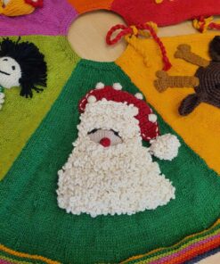 Close-up of Santa appliqué on green wedge of Hand Knit Christmas Tree Skirt