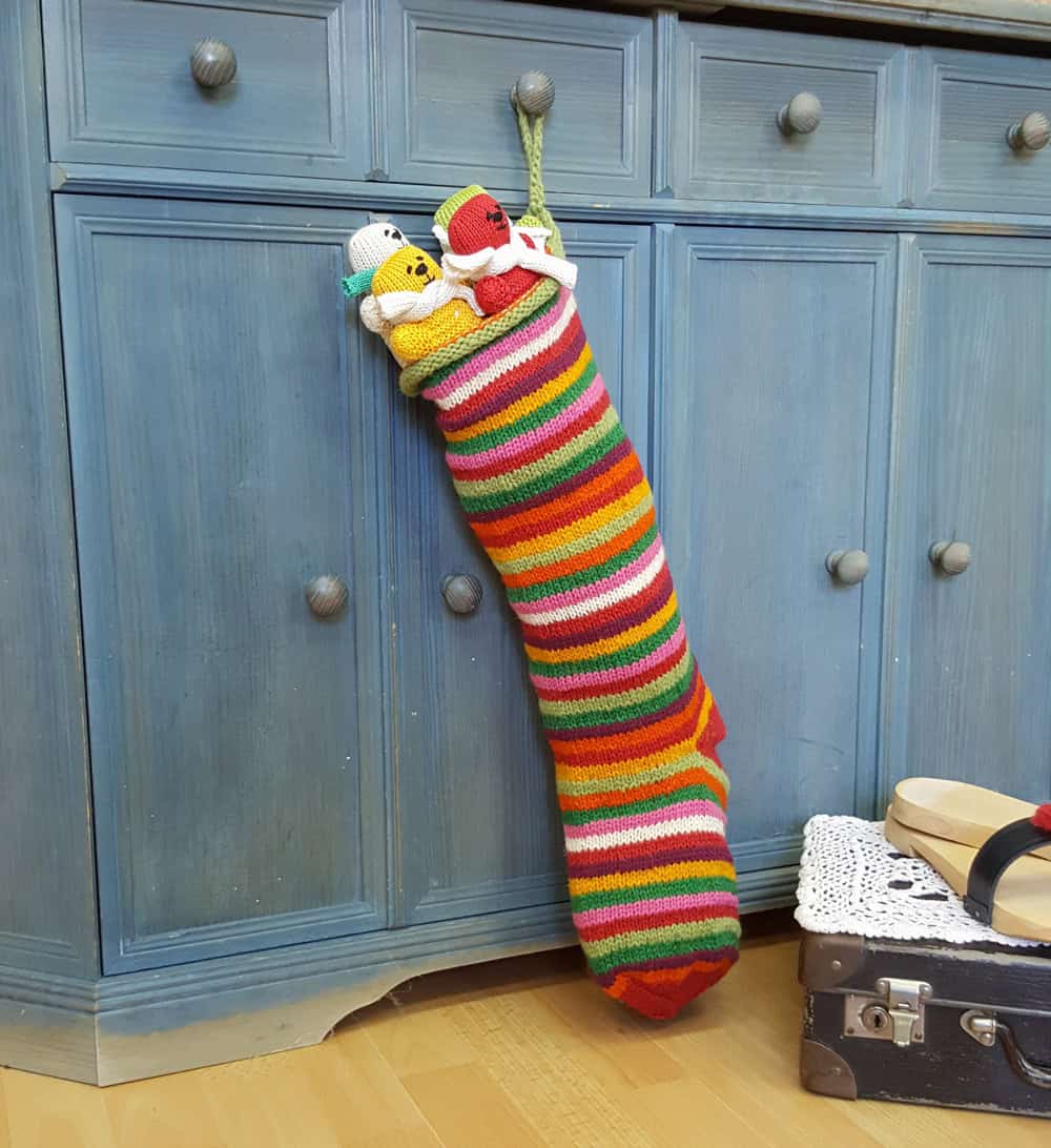 Hand-knit striped Christmas stocking, multicolor, artisan made holiday home decor