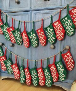 Hand-knit Christmas advent calendar garland of 24 mini stockings hanging on a wall