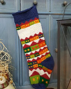 Holiday village motif on fair trade Christmas stocking which is eco-friendly made.