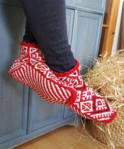 Artisan's handmade wool slippers with red and white design
