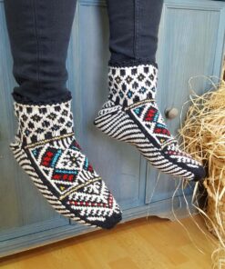 Traditional Bosnian pattern wool slipper socks on feet