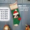 Hand-knit dog Christmas stocking with multicolor dog motifs, green/red accents