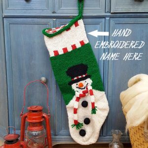 Personalized hand-knitted Christmas stocking with embroidered custom name and snowman design