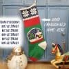 Hand-knit Christmas stocking with snowball applique.