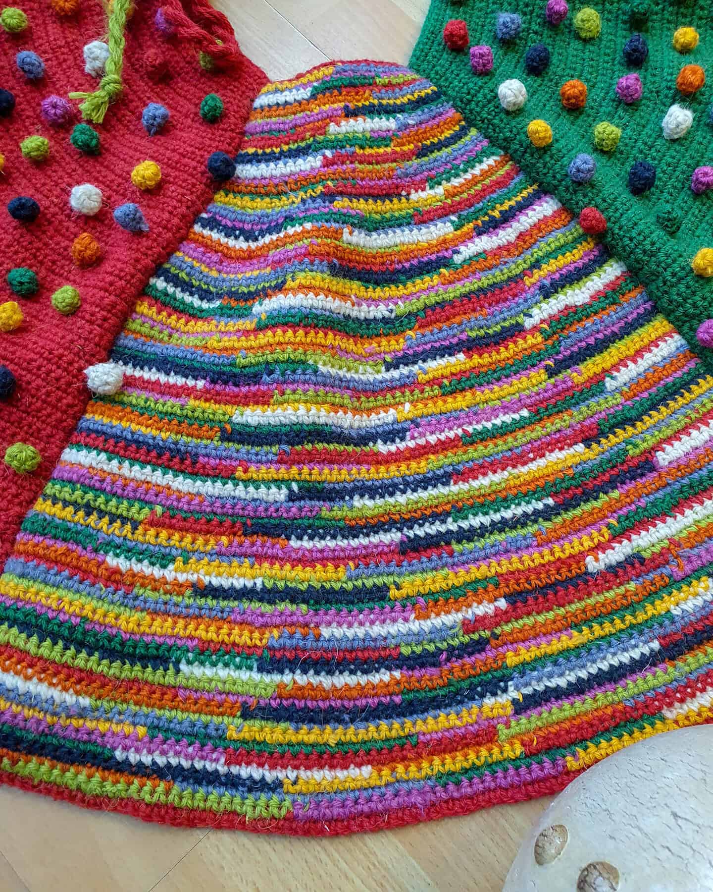 Detailed crochet texture of a fair-trade Christmas tree skirt showing artisan craftsmanship.