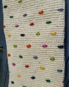 Close-up of crochet stitch detail on personalized holiday stocking for your Festive home decor
