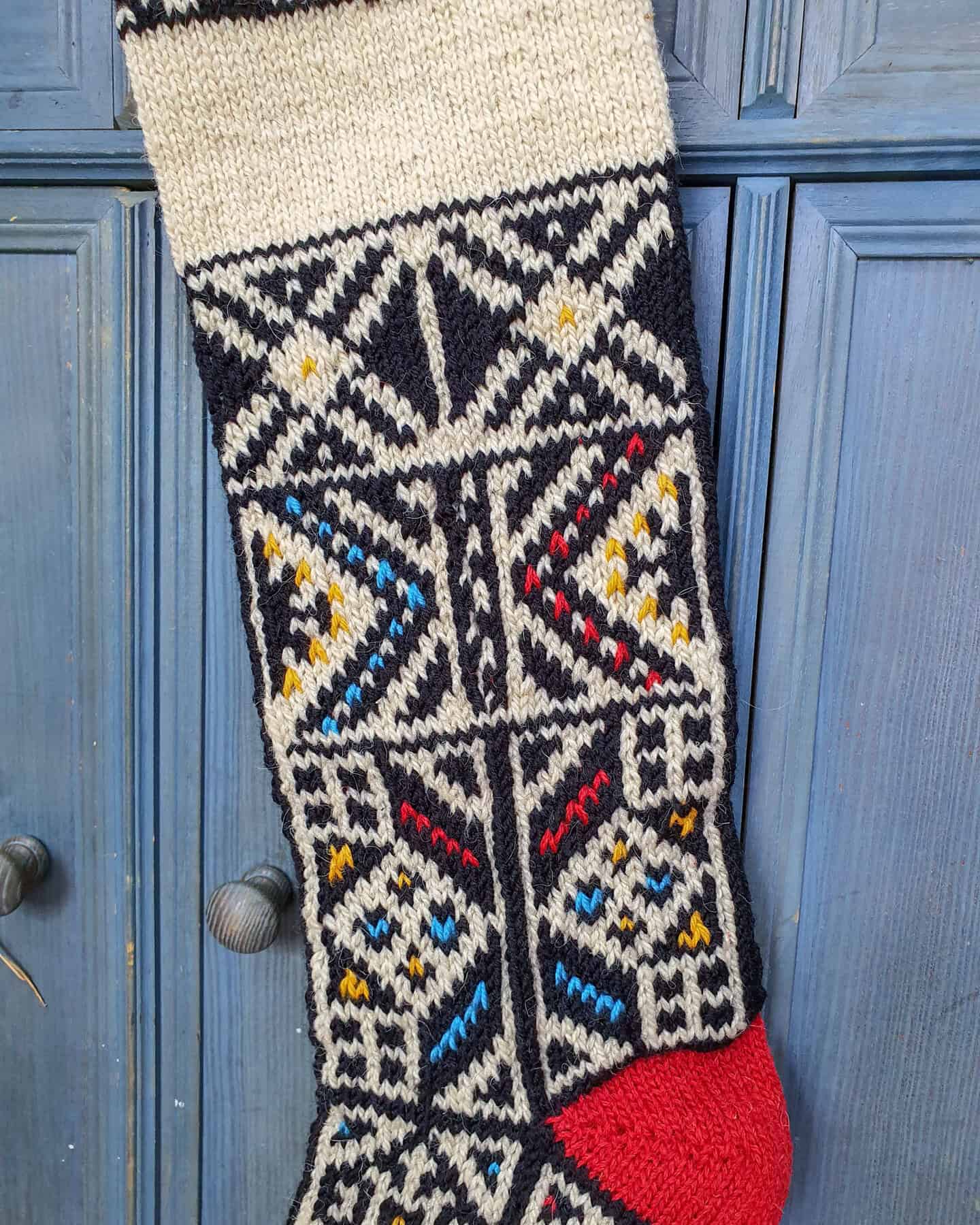 Close-up of Bosnian slipper sock pattern on Christmas stocking to charm your holiday home decor
