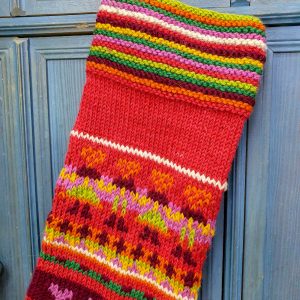 Close-up of placement for embroidered name area on personalized striped Christmas stocking.