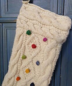 Fair‑trade handmade Bosnian cable‑knit Christmas stocking with multicolored pom-pons