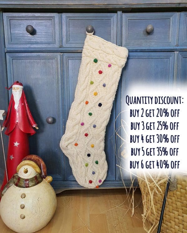 Elegant hand-knitted Christmas stocking with classic cable-knit pattern