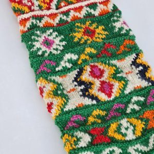 Detailed view of traditional Bosnian rug motifs on the stocking