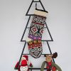Personalized Christmas stocking hanging on Christmas tree shape in sophisticated navy design for your holiday decor