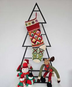 Traditional Holiday stocking hanging on Christmas tree shape