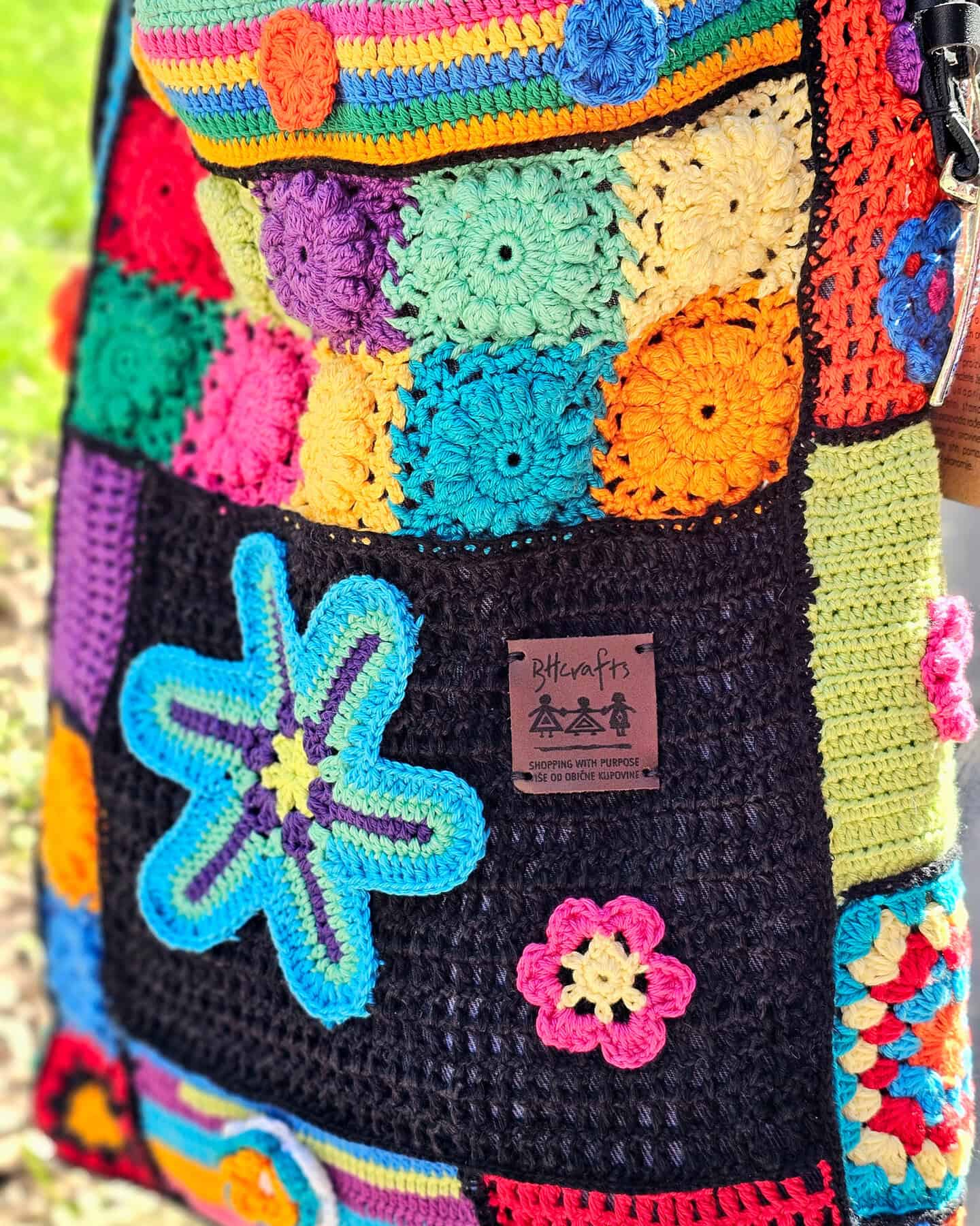 Side view of handmade linen Boho bag with detailed crochet texture