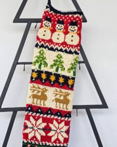 Top view of handmade Christmas stocking showing the opening and interior space for gifts.