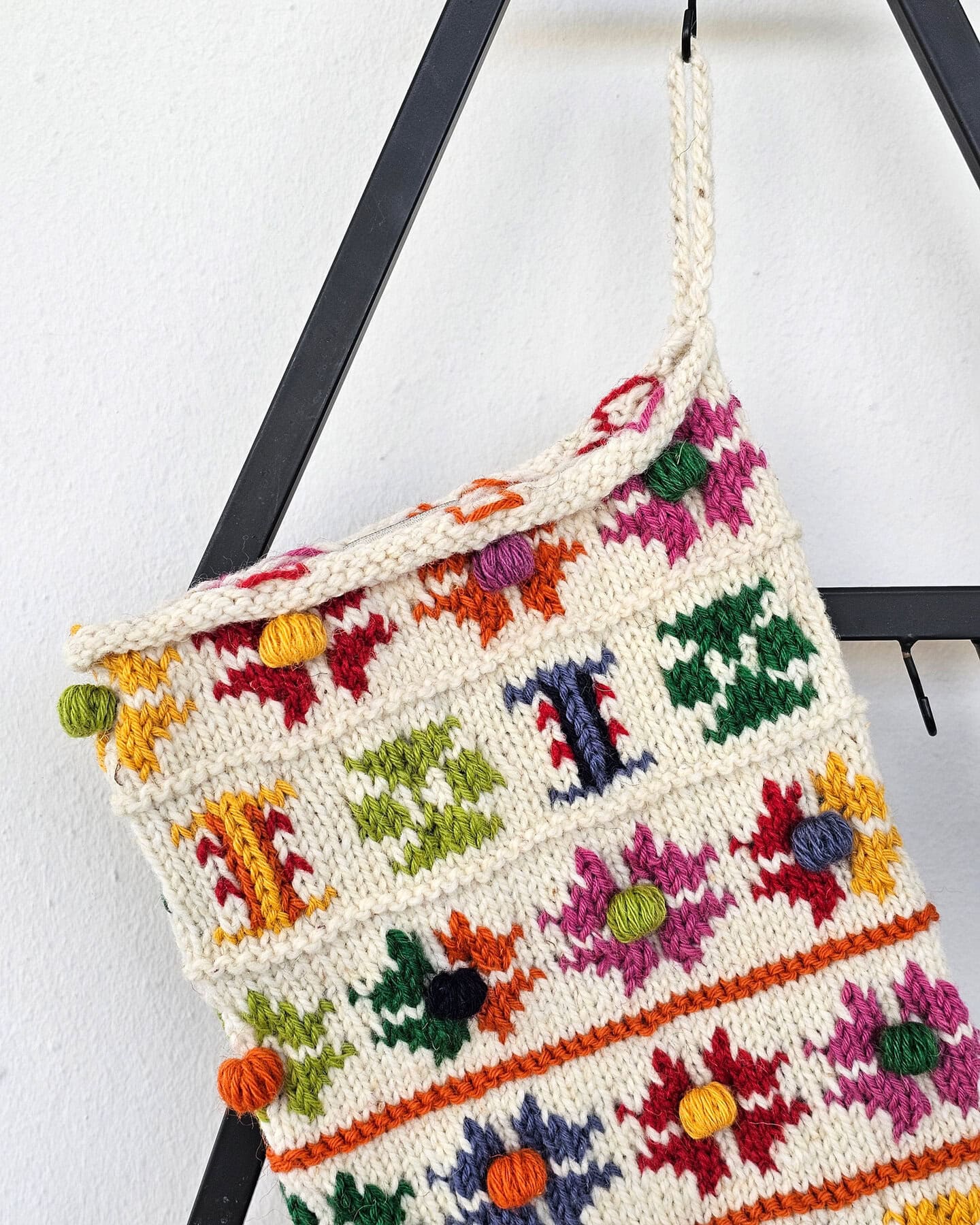 Texture view of Fair Trade wool Christmas stocking in multicolor design