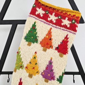 Christmas stocking displayed on a mantel with holiday decorations and a cozy ambiance.