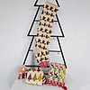 Christmas stocking displayed on a Christmas tree shape with holiday decorations and a cozy ambiance.