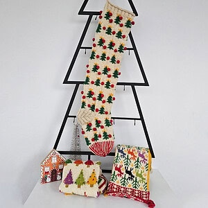 Christmas stocking displayed on a Christmas tree shape with holiday decorations and a cozy ambiance.