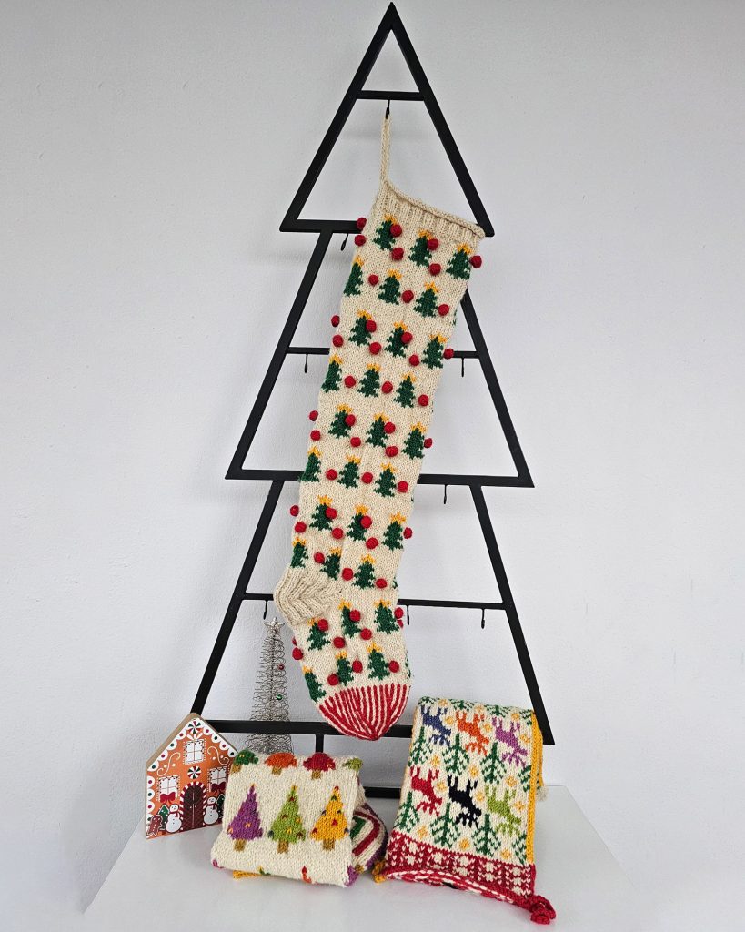 Christmas stocking displayed on a Christmas tree shape with holiday decorations and a cozy ambiance.