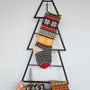 Christmas stocking displayed with holiday decorations and a cozy ambiance.