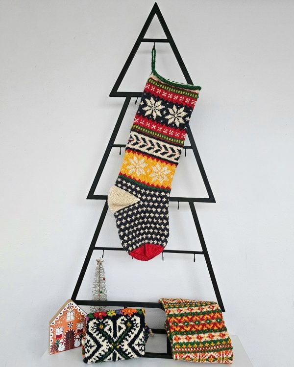 Christmas stocking displayed with holiday decorations and a cozy ambiance.