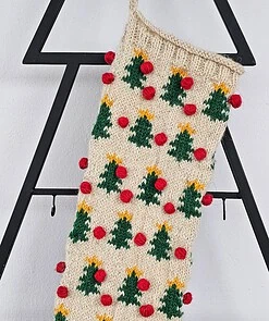 Top-down view of hand-knit Christmas stocking showing the opening for gifts and interior space.