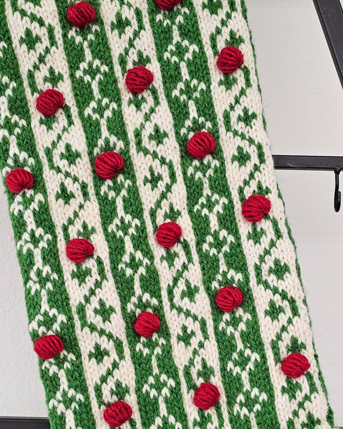 Artisan knit Christmas stocking handmade WFTO certified red, green, white festive decor