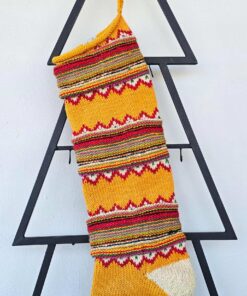 Close-up of chevron zigzag pattern on Christmas stocking, perfect for your holiday home decor