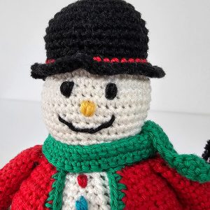 Fair trade crocheted snowman holiday decoration with black hat