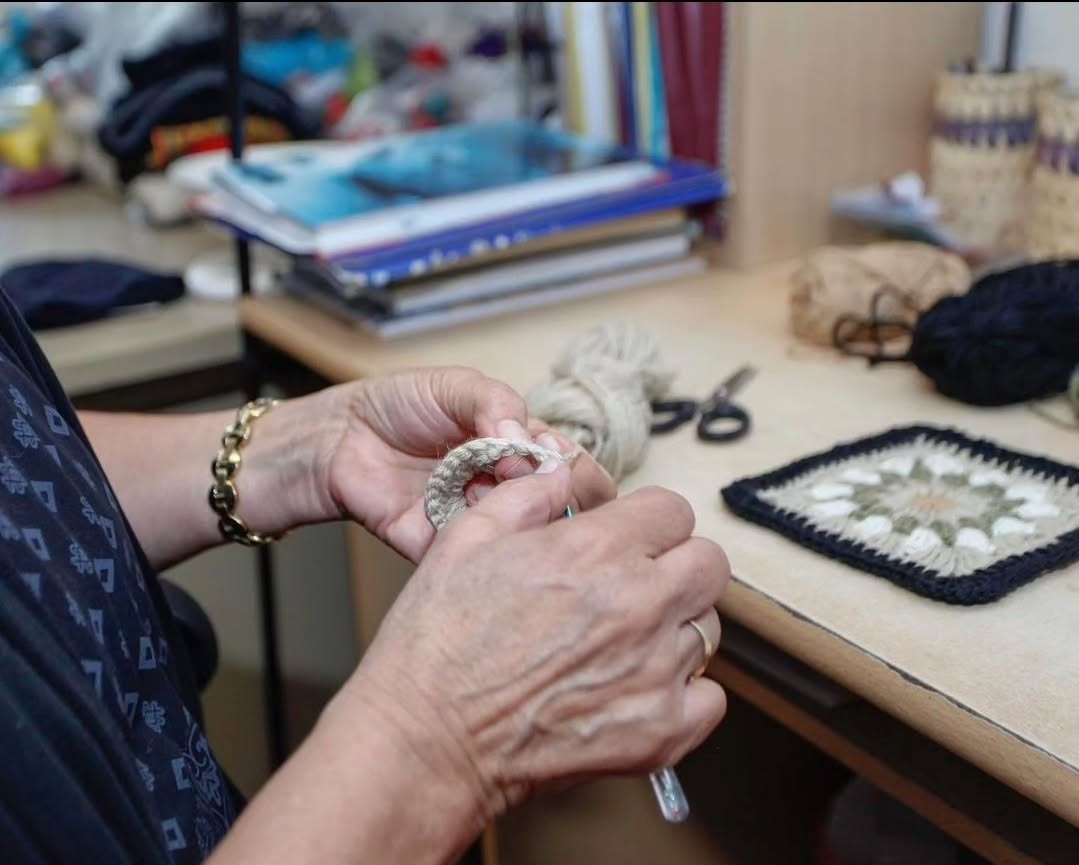 Women artisan hand crocheting for BHcrafts