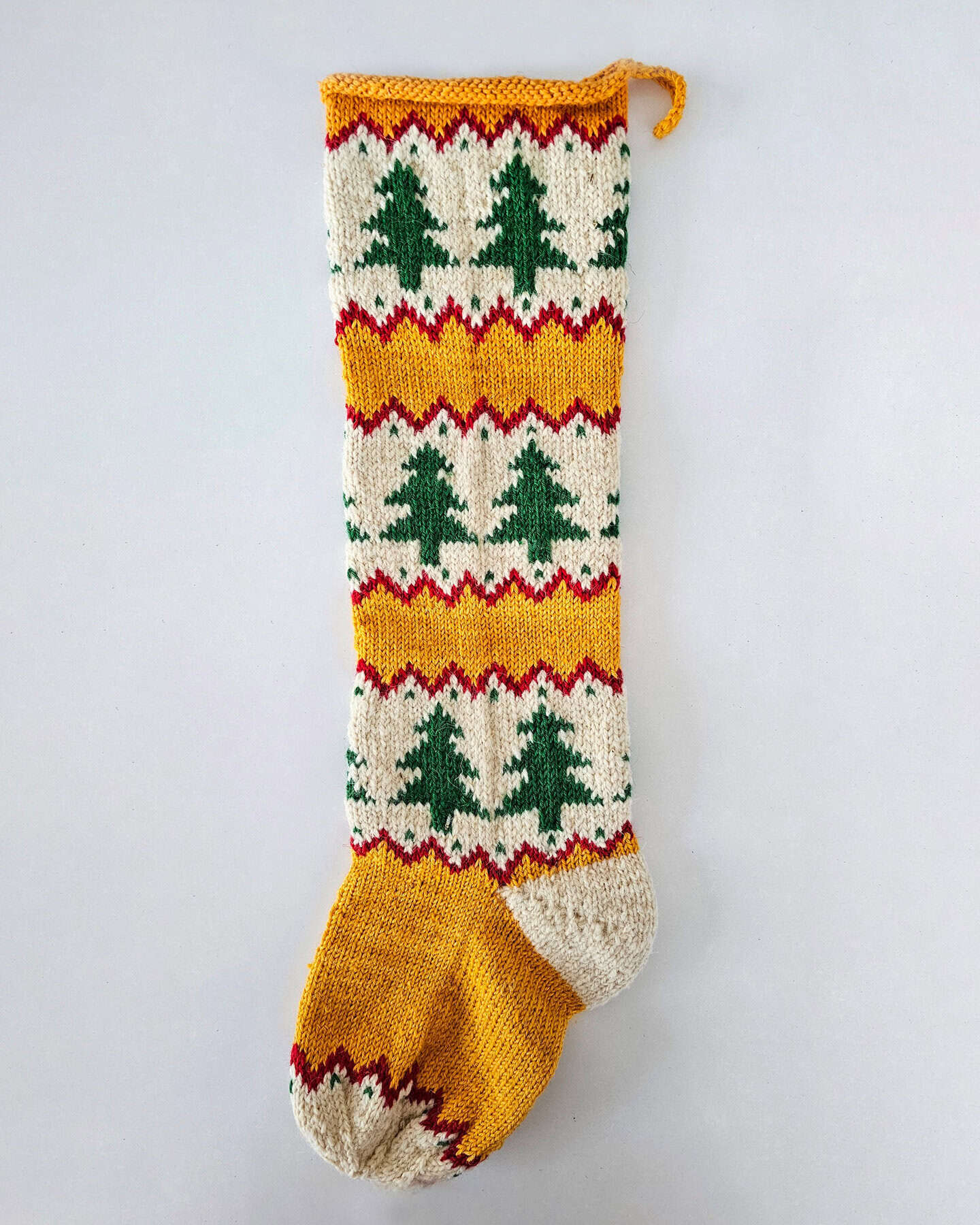Hand‑Knit Festive Tree & Chevron Christmas Stocking. Holiday home decor