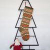 Handmade Christmas stocking with red, green, and yellow Fair Isle pattern